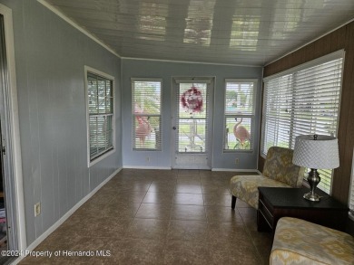 HOT TUB on large rear patio on the GOLF COURSE Located on a on High Point Golf Club, Inc. in Florida - for sale on GolfHomes.com, golf home, golf lot