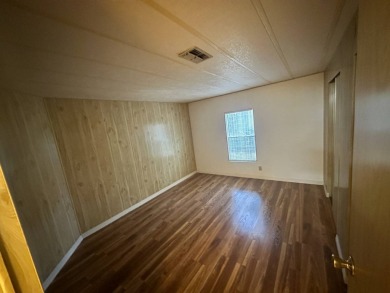 Lot Rent $1037.00    This well cared for 2-bedroom, 2-bathroom on Del Tura Golf and Country Club in Florida - for sale on GolfHomes.com, golf home, golf lot