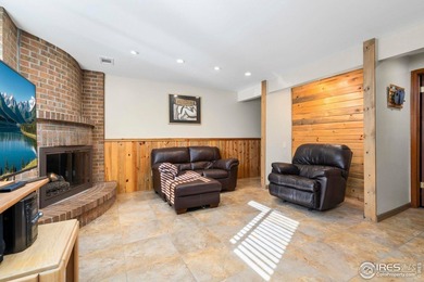 Located on a quiet street in the heart of Loveland, this home on The Olde Course At Loveland in Colorado - for sale on GolfHomes.com, golf home, golf lot