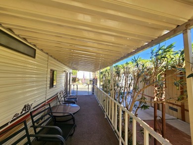 This charming 1990 1-bedroom, 1-bath mobile home is located in on Sands RV and Golf Resort in California - for sale on GolfHomes.com, golf home, golf lot