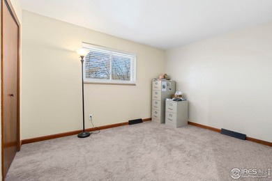 Located on a quiet street in the heart of Loveland, this home on The Olde Course At Loveland in Colorado - for sale on GolfHomes.com, golf home, golf lot