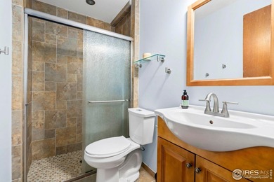 Located on a quiet street in the heart of Loveland, this home on The Olde Course At Loveland in Colorado - for sale on GolfHomes.com, golf home, golf lot