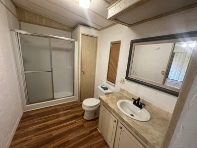 Lot Rent $1037.00    This well cared for 2-bedroom, 2-bathroom on Del Tura Golf and Country Club in Florida - for sale on GolfHomes.com, golf home, golf lot