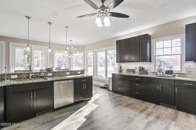 Discover luxury and comfort in this beautifully remodeled home on River Landing Golf Course in North Carolina - for sale on GolfHomes.com, golf home, golf lot