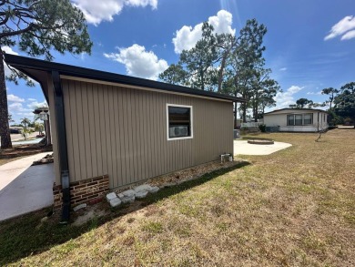 Lot Rent $1037.00    This well cared for 2-bedroom, 2-bathroom on Del Tura Golf and Country Club in Florida - for sale on GolfHomes.com, golf home, golf lot