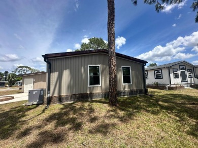 Lot Rent $1037.00    This well cared for 2-bedroom, 2-bathroom on Del Tura Golf and Country Club in Florida - for sale on GolfHomes.com, golf home, golf lot