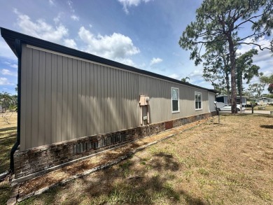 Lot Rent $1037.00    This well cared for 2-bedroom, 2-bathroom on Del Tura Golf and Country Club in Florida - for sale on GolfHomes.com, golf home, golf lot