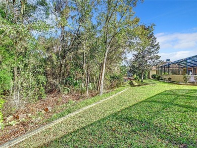 Experience Florida Living in this Stunning Pool Home in Hernando on Hernando Oaks Golf and Country Club in Florida - for sale on GolfHomes.com, golf home, golf lot