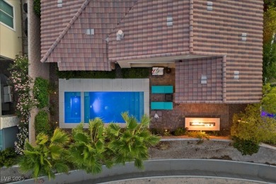 This stunning single-story home offers an open-concept design on South Shore At Lake Las Vegas in Nevada - for sale on GolfHomes.com, golf home, golf lot