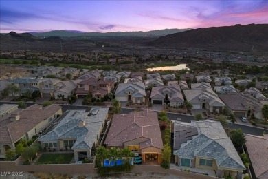 This stunning single-story home offers an open-concept design on South Shore At Lake Las Vegas in Nevada - for sale on GolfHomes.com, golf home, golf lot