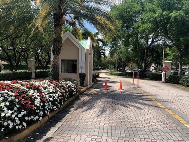 This condo is located in the prestigious *The Island* section of on Sunrise Lakes Phase IV Golf Course in Florida - for sale on GolfHomes.com, golf home, golf lot