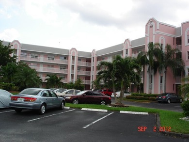 This condo is located in the prestigious *The Island* section of on  in Florida - for sale on GolfHomes.com, golf home, golf lot