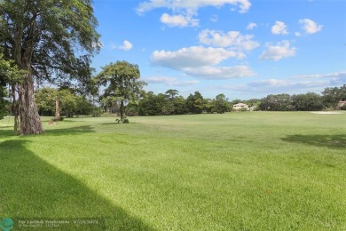 Ground Floor King Unit on Beautiful Oaks Way! This 3 Bedroom 2 on Palm-Aire Country Club and Resort - The Oaks in Florida - for sale on GolfHomes.com, golf home, golf lot