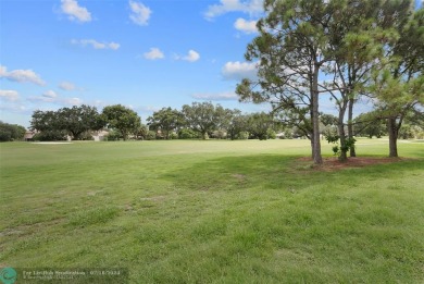 Ground Floor King Unit on Beautiful Oaks Way! This 3 Bedroom 2 on Palm-Aire Country Club and Resort - The Oaks in Florida - for sale on GolfHomes.com, golf home, golf lot