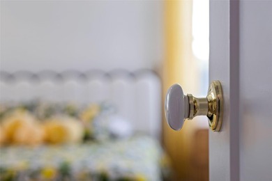 MAJOR PRICE IMPROVEMENT! Tucked away in the heart of Dunedin on The Dunedin Country Club in Florida - for sale on GolfHomes.com, golf home, golf lot