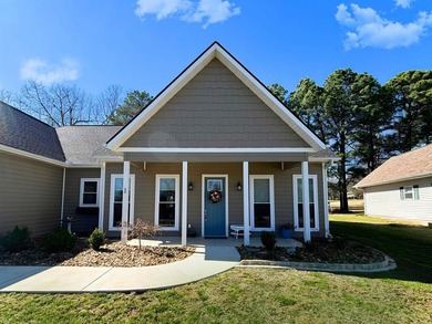 A rare opportunity to own a 2024 custom home overlooking the #12 on Cherokee Village South Course in Arkansas - for sale on GolfHomes.com, golf home, golf lot