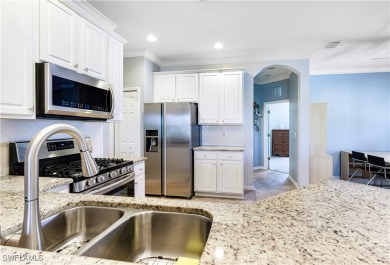 JUST REDUCED! This Pelican Preserve TURNKEY attached villa is on Pelican Preserve Golf Club in Florida - for sale on GolfHomes.com, golf home, golf lot