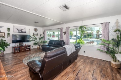 This charming and well-maintained, recently updated 2-bedroom on Fountain of the Sun Country Club in Arizona - for sale on GolfHomes.com, golf home, golf lot