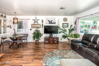 This charming and well-maintained, recently updated 2-bedroom on Fountain of the Sun Country Club in Arizona - for sale on GolfHomes.com, golf home, golf lot