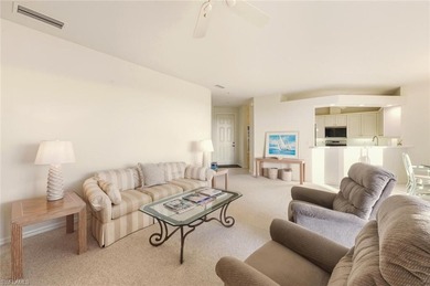 In the center of Pelican Marsh, this elegantly finished on Pelican Marsh Golf Club in Florida - for sale on GolfHomes.com, golf home, golf lot