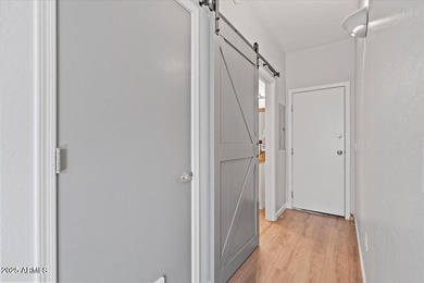 Move-in ready and beautifully updated! This end-unit townhome in on Augusta Ranch Golf Club in Arizona - for sale on GolfHomes.com, golf home, golf lot