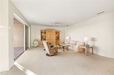 In the center of Pelican Marsh, this elegantly finished on Pelican Marsh Golf Club in Florida - for sale on GolfHomes.com, golf home, golf lot