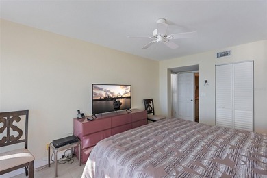 Straight from the pages of Coastal Living, this pristine on Isla Del Sol Yacht and Country Club in Florida - for sale on GolfHomes.com, golf home, golf lot