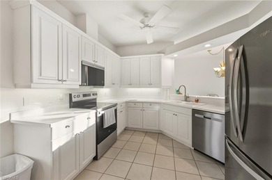 In the center of Pelican Marsh, this elegantly finished on Pelican Marsh Golf Club in Florida - for sale on GolfHomes.com, golf home, golf lot