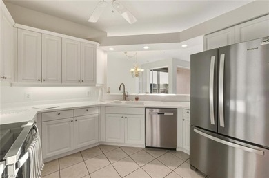 In the center of Pelican Marsh, this elegantly finished on Pelican Marsh Golf Club in Florida - for sale on GolfHomes.com, golf home, golf lot