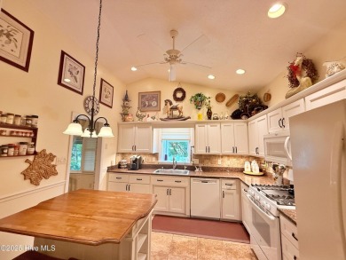 CREAM PUFF ALERT!
This brick home is nestled on a beautifully on River Bend Golf and Country Club in North Carolina - for sale on GolfHomes.com, golf home, golf lot