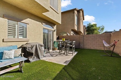 Move-in ready and beautifully updated! This end-unit townhome in on Augusta Ranch Golf Club in Arizona - for sale on GolfHomes.com, golf home, golf lot