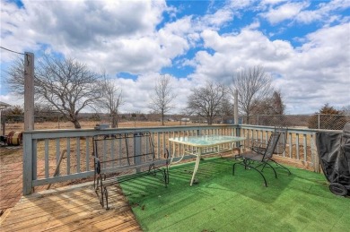 Discover the perfect blend of comfort and functionality in this on Linn Valley Lakes - Deer Trace Golf Course in Kansas - for sale on GolfHomes.com, golf home, golf lot