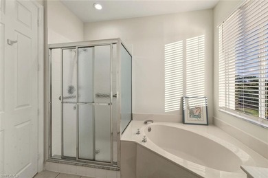 In the center of Pelican Marsh, this elegantly finished on Pelican Marsh Golf Club in Florida - for sale on GolfHomes.com, golf home, golf lot