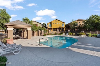 Move-in ready and beautifully updated! This end-unit townhome in on Augusta Ranch Golf Club in Arizona - for sale on GolfHomes.com, golf home, golf lot