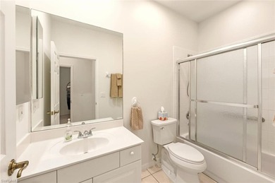 In the center of Pelican Marsh, this elegantly finished on Pelican Marsh Golf Club in Florida - for sale on GolfHomes.com, golf home, golf lot