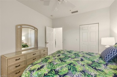 In the center of Pelican Marsh, this elegantly finished on Pelican Marsh Golf Club in Florida - for sale on GolfHomes.com, golf home, golf lot