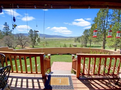 Nestled among the tree line, at the base of Osha mountain peak on Angel Fire Resort Country Club in New Mexico - for sale on GolfHomes.com, golf home, golf lot