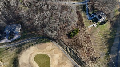 Build your dream home on this .78-acre homesite featuring on Sevierville Golf Club in Tennessee - for sale on GolfHomes.com, golf home, golf lot