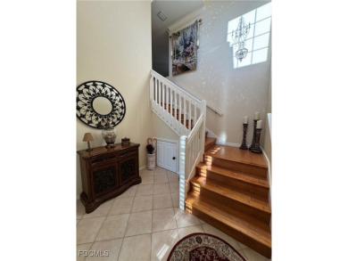Luxurious coach home with gorgeous settings in Glen Eagle Golf on Glen Eagle Golf and Country Club in Florida - for sale on GolfHomes.com, golf home, golf lot