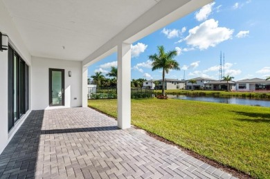 A resort-style lifestyle awaits at this exceptional Samoa model on Boca Raton Municipal Golf Course in Florida - for sale on GolfHomes.com, golf home, golf lot