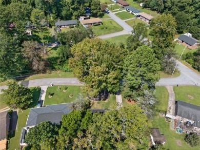 Welcome to this inviting brick ranch in the East Lake Terrace on East Lake Golf Club in Georgia - for sale on GolfHomes.com, golf home, golf lot
