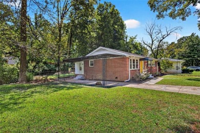 Welcome to this inviting brick ranch in the East Lake Terrace on East Lake Golf Club in Georgia - for sale on GolfHomes.com, golf home, golf lot