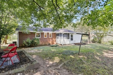 Welcome to this inviting brick ranch in the East Lake Terrace on East Lake Golf Club in Georgia - for sale on GolfHomes.com, golf home, golf lot