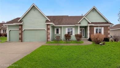 This stunning, spacious Ranch style home boasts an impressive on Otter Creek Golf Course in Iowa - for sale on GolfHomes.com, golf home, golf lot