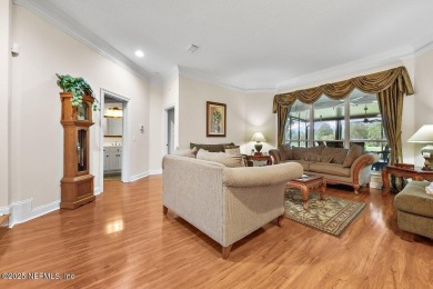 Overlooking the 11th hole, this Earl Whitehurst-built home on Hidden Hills Country Club in Florida - for sale on GolfHomes.com, golf home, golf lot