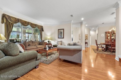 Overlooking the 11th hole, this Earl Whitehurst-built home on Hidden Hills Country Club in Florida - for sale on GolfHomes.com, golf home, golf lot