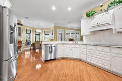 Overlooking the 11th hole, this Earl Whitehurst-built home on Hidden Hills Country Club in Florida - for sale on GolfHomes.com, golf home, golf lot