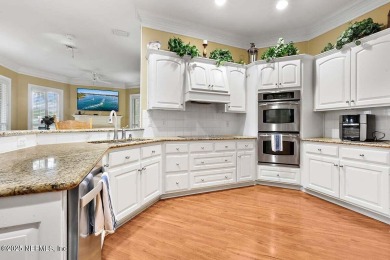 Overlooking the 11th hole, this Earl Whitehurst-built home on Hidden Hills Country Club in Florida - for sale on GolfHomes.com, golf home, golf lot