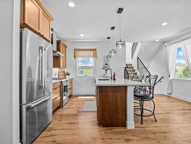 West Ridges Townhouse is a 2,617# square foot luxury residence on The Golf Club At Redlands Mesa in Colorado - for sale on GolfHomes.com, golf home, golf lot