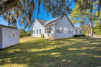 What a lovely home this one is, and it's just minutes from the on Pawleys Plantation Golf and Country Club in South Carolina - for sale on GolfHomes.com, golf home, golf lot